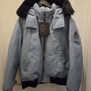 Moose Knuckles Light Blue Puffer Jacket with Black Accent